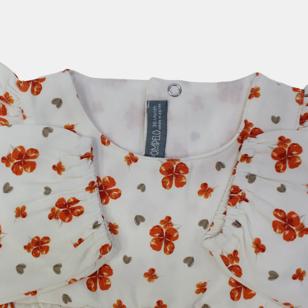 Bluse mit Blumenmuster und Rüschen an den Schultern, langärmlig