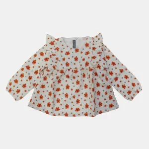 Bluse mit Blumenmuster und Rüschen an den Schultern, langärmlig